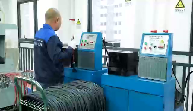 Operator at fixtured assembly equipment